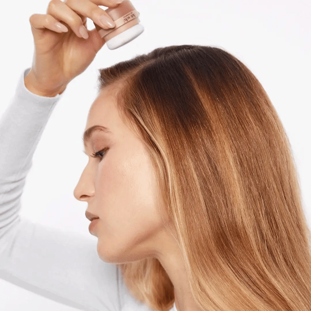 Kitsch Dry Shampoo - showing blond lady using it