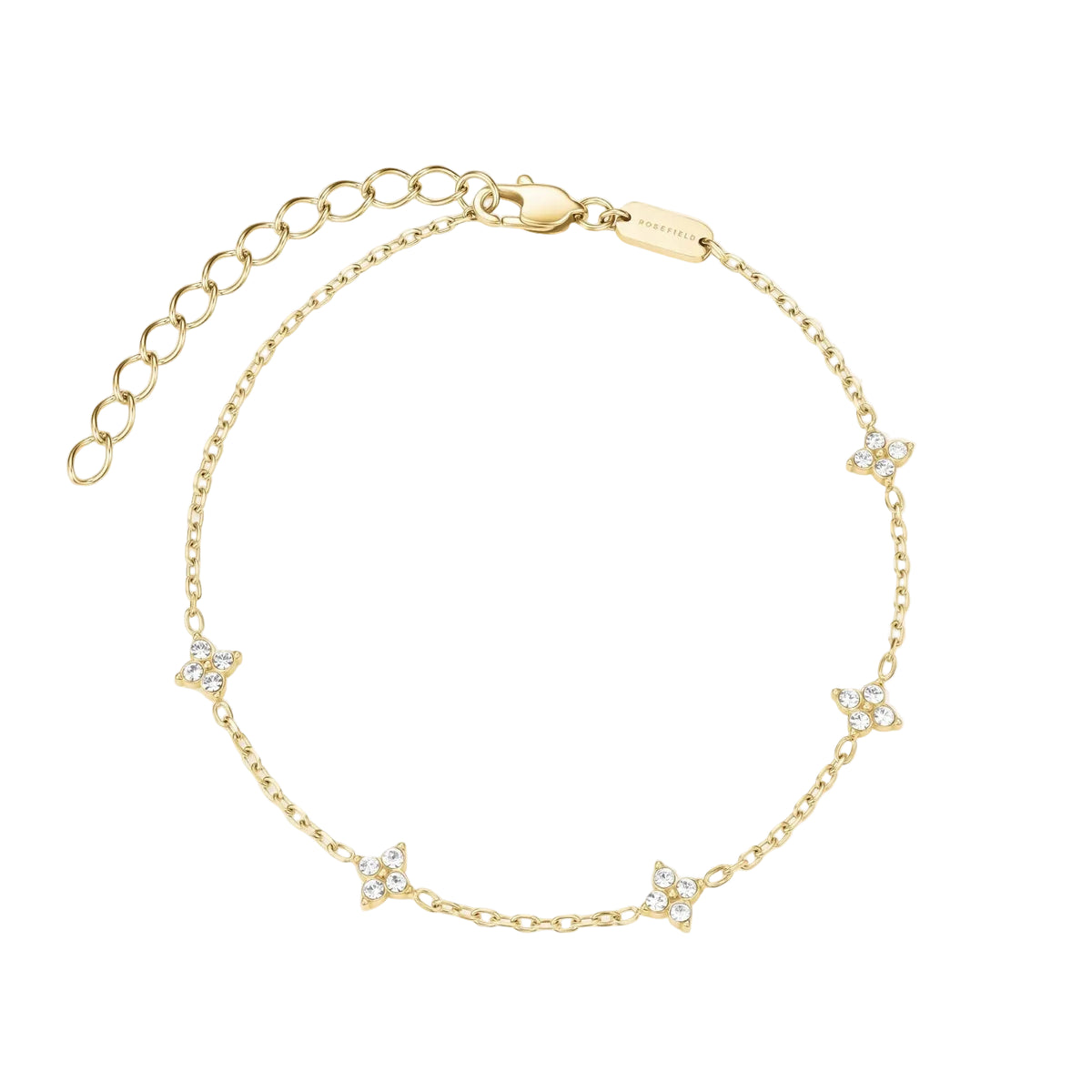 A delicate gold chain bracelet with five small butterfly motifs set with clear crystals, displayed on a light cream background.